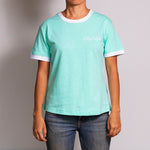 Close up shot of the Wild Mint T-shirt by Holystoked India. The T-shirt is worn by an Indian female skater.