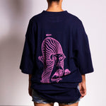 Rear view of the Rave Kong shirt, worn by Channy, a local female Indian skater.