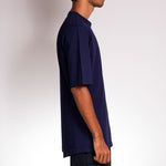 Side view of a skateboarder from Bangalore wearing skate Crew Shirt Navy.