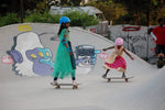 Girls learning to skate at The Cave Skatepark.